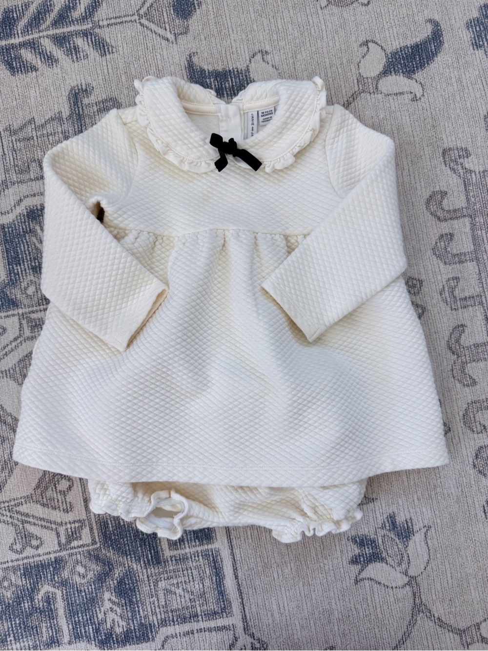 Janie and Jack Baby Girl Cream Textured Dress with Black Bow